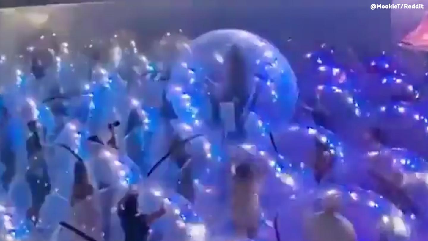 The Flaming Lips Rock Out On Stage In Plastic Bubbles
