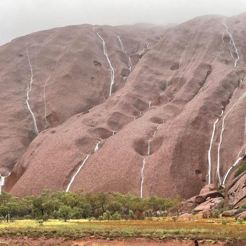 Mother Nature Brings Waterfalls On Uluru