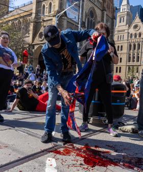 Fake Blood-Soaked Flags Burned At Protests Across The Country On The Queen's National Day Of Mourning